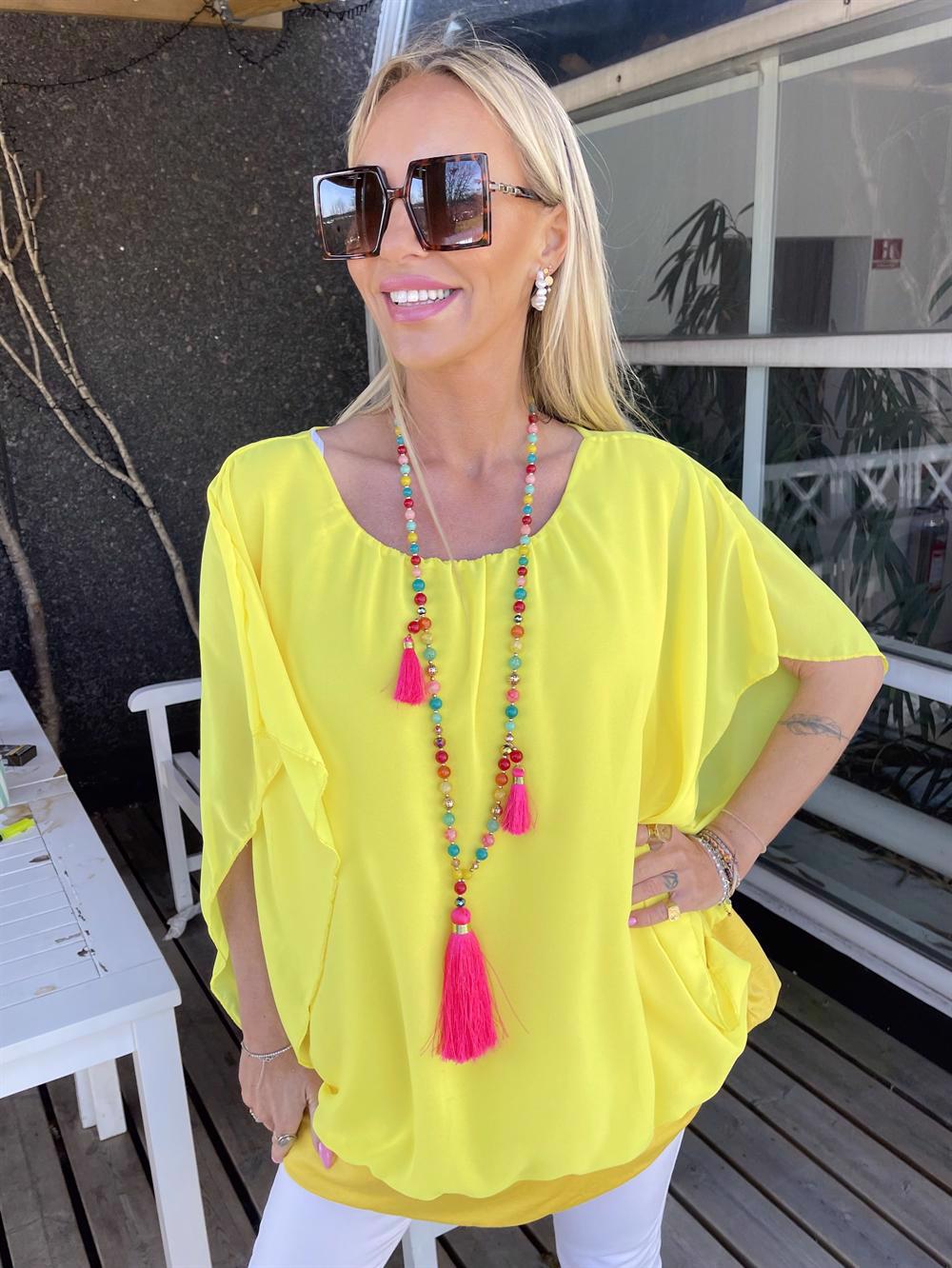 Tea - Top med løst chiffonstof udover